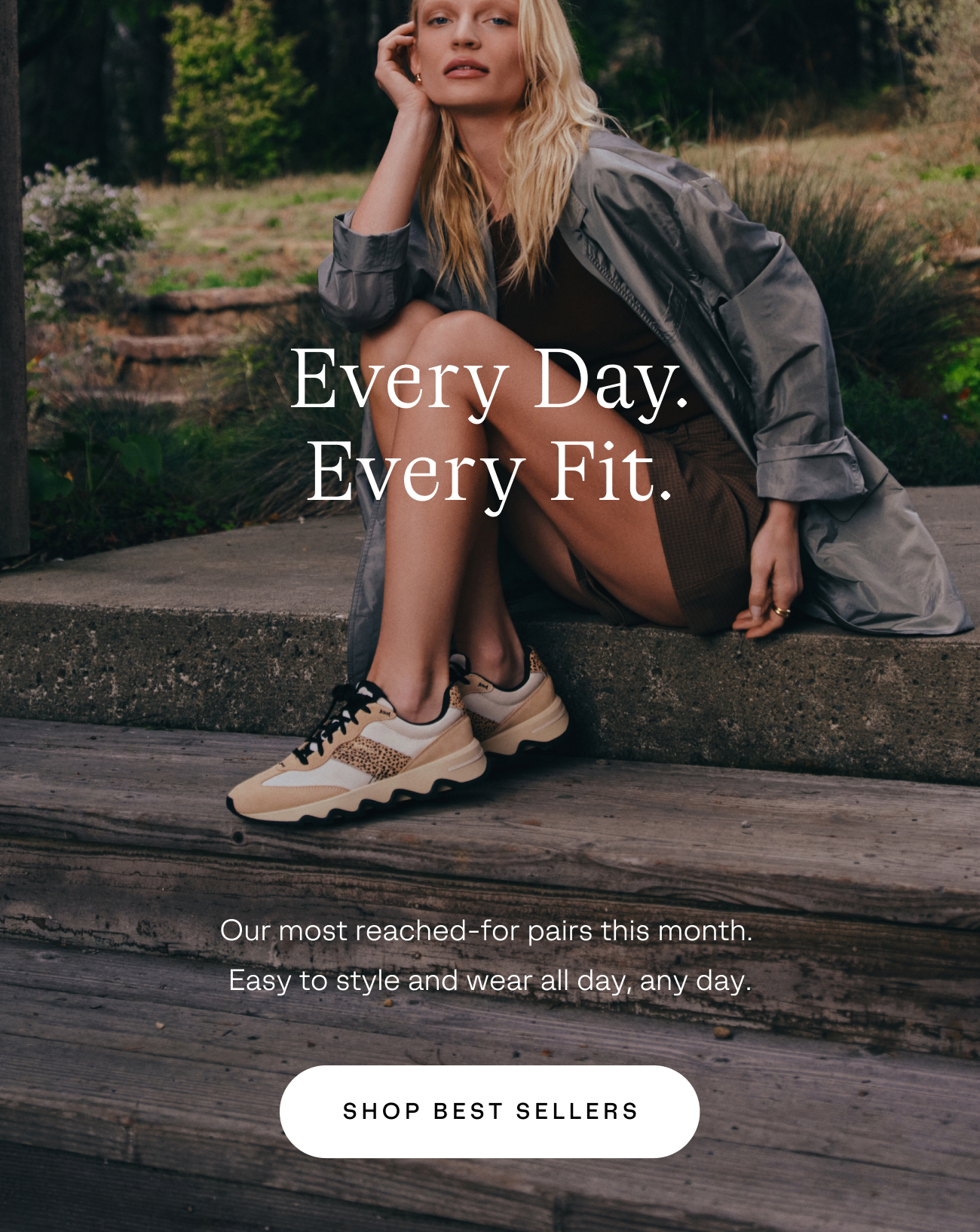 Best Sellers image featuring women sitting down on weathered steps in Kinetic Ember Sneaker