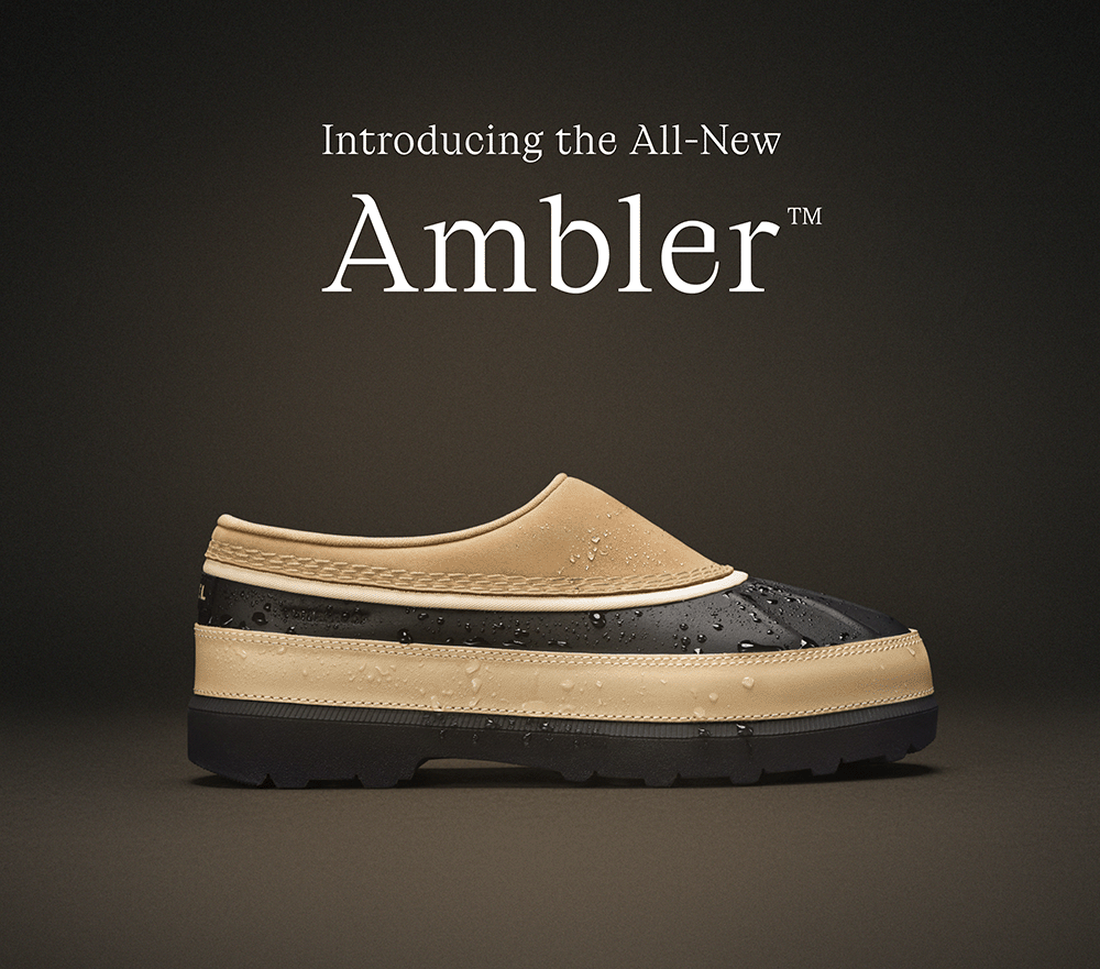 Introducing the All-New Ambler™ - photo of Ambler™ Waterproof Clog with water drops on shoe.