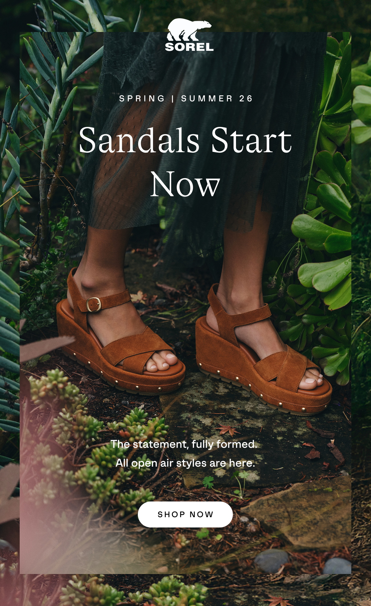SOREL sandals surrounded by green foliage